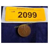 1937 German coin with swastika.