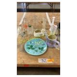 Decorative plate, watering can, vases