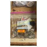 Bag of tokens and jewelry