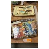 Boxes of old papers, photos, paper dolls