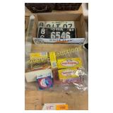 Old license plates, empty advertising boxes