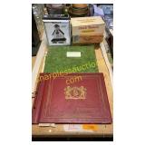 Old photo albums, cigar boxes, whiskey decanter