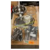 Silverware, strainer, baking dish