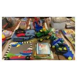 Toys, backpack, books, roller skates