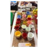 Mickey Mouse and jimmy cricket cups