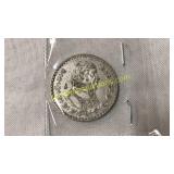 Old Mexican silver dollar