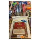 Cigar box of matches, books, Mercedes manual