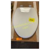 Elongated plastic toilet seat