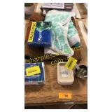 Toothpaste, bathroom rugs, measuring cups