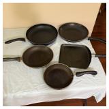(4) Skillets 7 (1) Griddle Pan