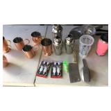 Drink shakers, metal cups, drink  pourers, and