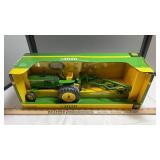 JD 1964 3020 TRACTOR WITH 4 BOTTOM PLOW