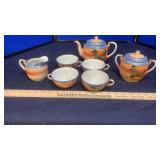 HAND PAINTED TEA CUPS & SAUCERS