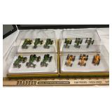 (4) J.D. DUBUQUE WORKS TRACTOR PACKS 1/64 SCALE