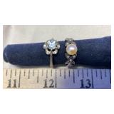 (2) LADIES AVON RINGS (BOTH STAMPED 925)