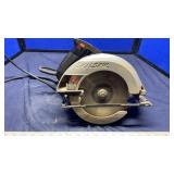 SKILSAW AND CAULK GUN