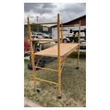 METAL SCAFFOLDING W/WHEELS