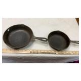 (2) CAST IRON PANS N0. 5 & 6-1/2'