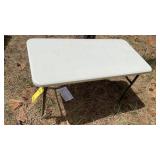 WHITE FOLDING TABLE MEASURES 48' X 24'