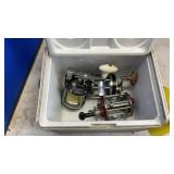 FISHING REELS, ROD HOLDER COOLER & MISC.