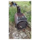CAST IRON APOSTLE STOVE, LOG RACK AND MORE