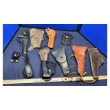 ASSORTED LEATHER HOLSTERS (MANY STAMPED U.S.)
