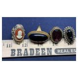 (4) COSTUME RINGS