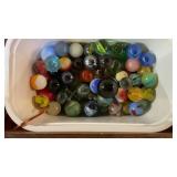MARBLES, BECKS CAN, OIL CANS & REEL