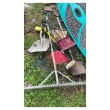 Snow shovels, rake, and sand shovel