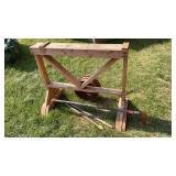 STEEL PIPE, CAR RIM AND WOODEN STAND