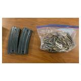 (2) MAGAZINES AND (62+/-) ROUNDS 5.56 AMMO