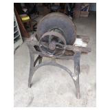 Industrial grinding wheel on cast iron base