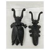 2 Cast Iron Beatle Boot Jacks. One larger Size.