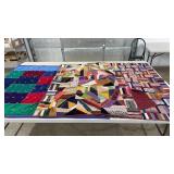 3 Tied Quilts. Largest is 52 x 64. Some damage.