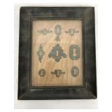 Vintage Metal Key Holes in a Frame