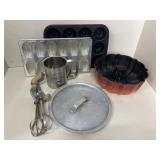 Kitchen ware- (2)12ct French shell shaped cake