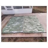 Two outdoor carpets both about 7' x 5'