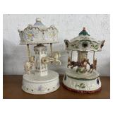 2 Musical Carousels. One Christmas. Taller is 10