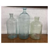 3 Vintage Glass Bottles. Tallest is 14.5 In.