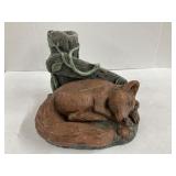 Concrete resting fox garden statue
