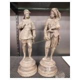 Metal figures depicting Eliz era men 13' tall