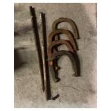 iron horseshoes and stakes