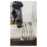 Youth golf clubs & bags. See photos