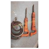 Two Jackhammers One Has A Hose One Is Missing A Two Jackhammers One Has A Hose One Is Missing A