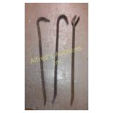 Crowbars and a plate wrench Crowbars and a plate wrench
