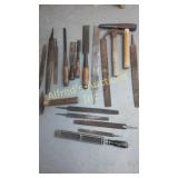 Files hammers and chisels sold together in a lot. Files hammers and chisels sold together in a lot.