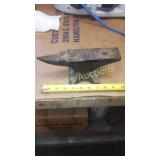 Small anvil. 9 and 1/4 inches tip to tail, 4 in