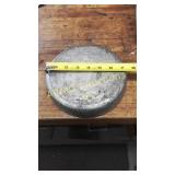 Lead slug. 7 and a quarter inch diameter by an Lead slug. 7 and a quarter inch diameter by an