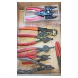 Snap ring pliers and a small cutter Snap ring pliers and a small cutter