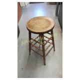 Wooden shop stool missing one rung, 29 in tall.